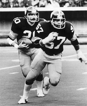 Sam Davis leading Rocky Bleier media photo